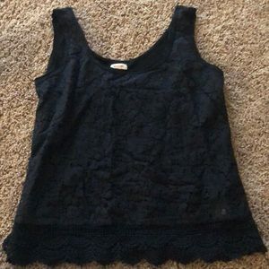 Black tank top with lace front.